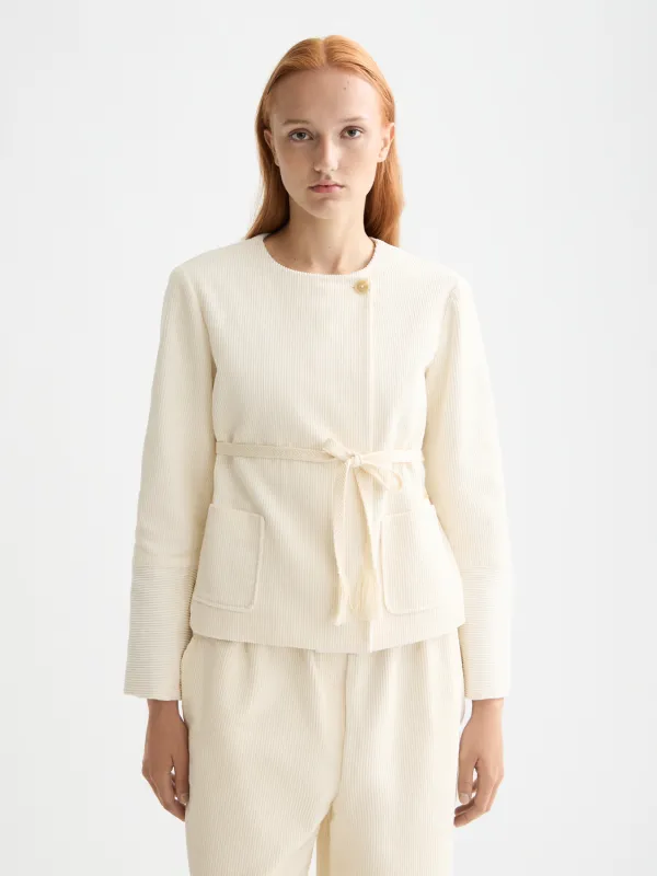 Belted collarless jacket made by Scotch & Soda