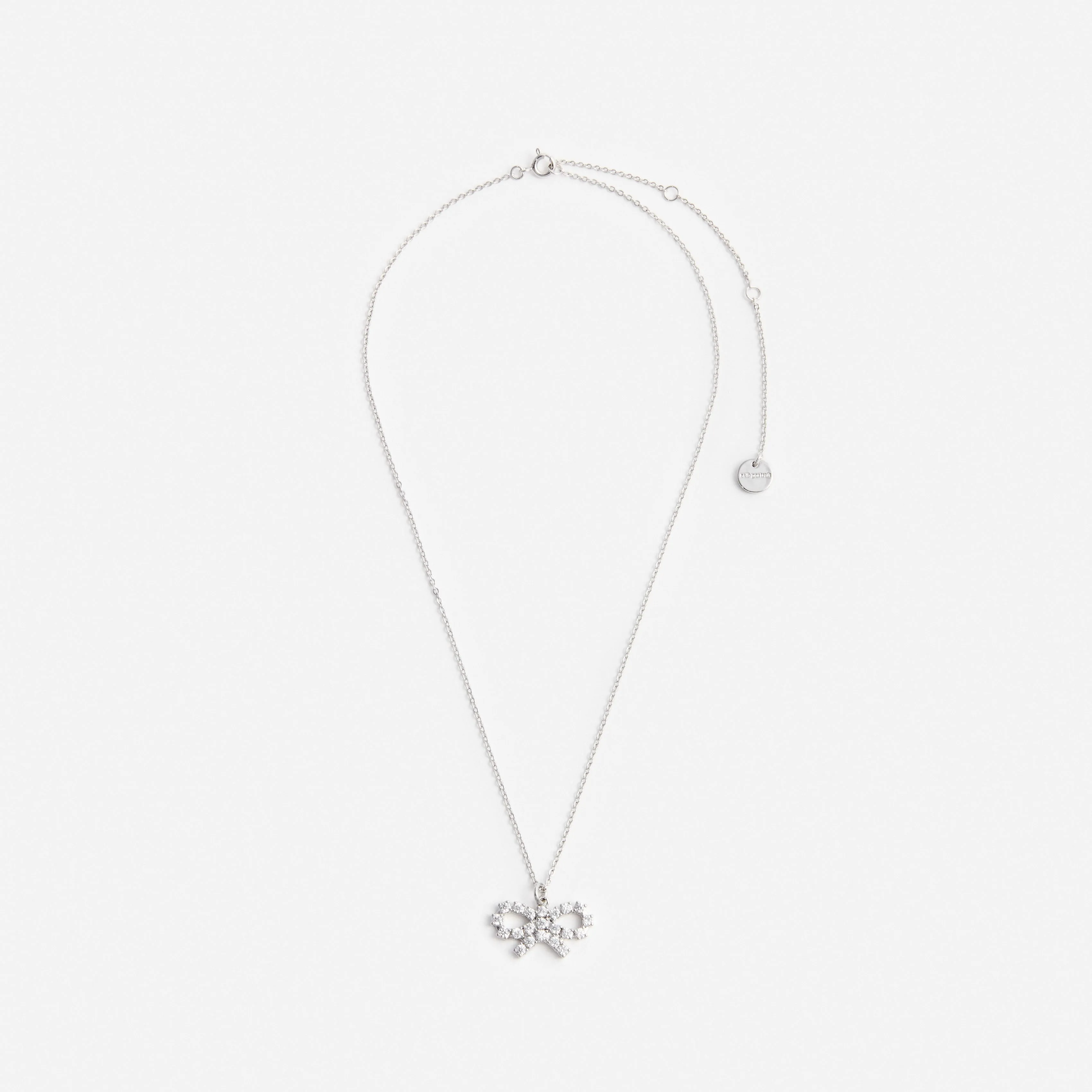 Micro Crystal Bow Necklace sold by Self-Portrait