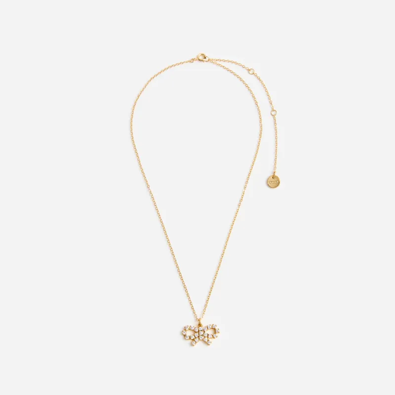 Micro Gold Bow Necklace made by Self-Portrait