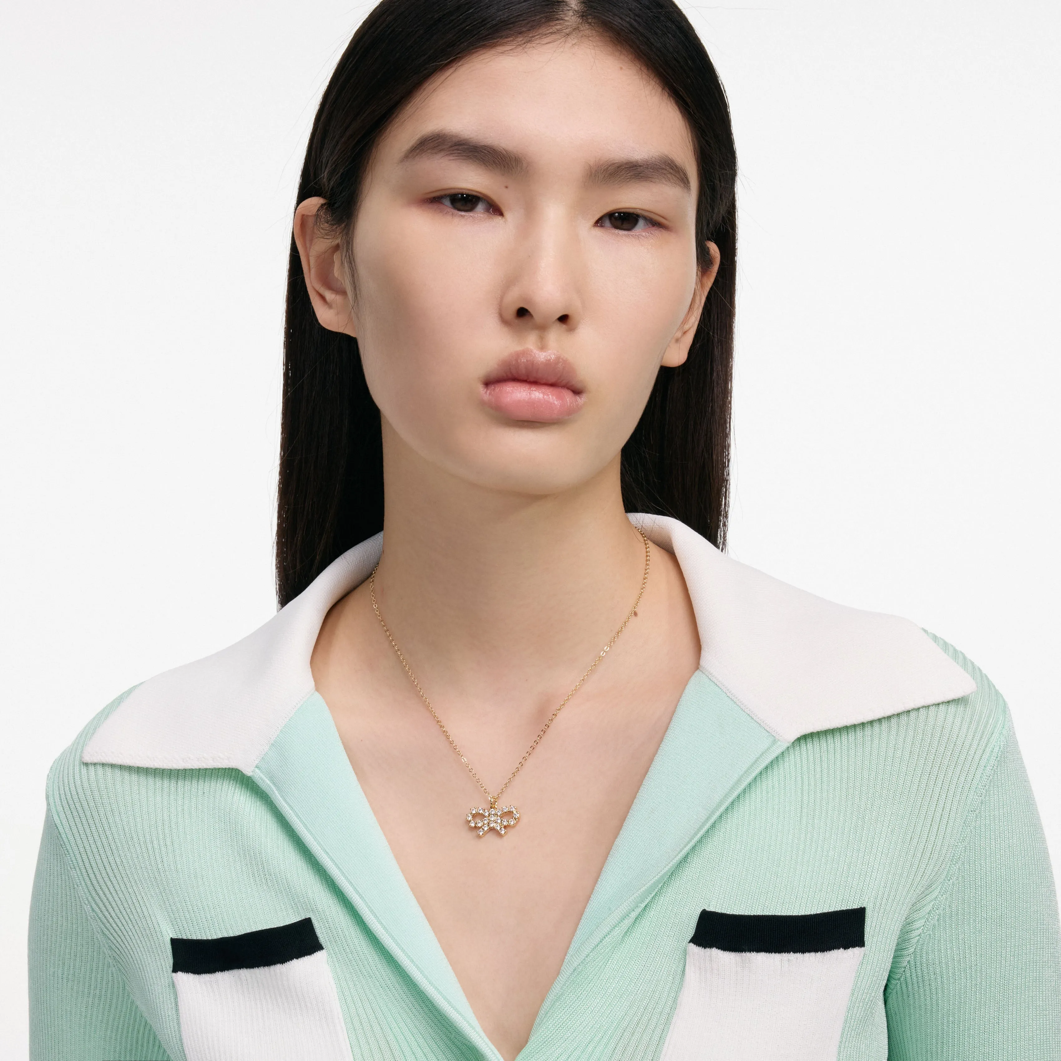 Micro Gold Bow Necklace sold by Self-Portrait product image thumbnail 2