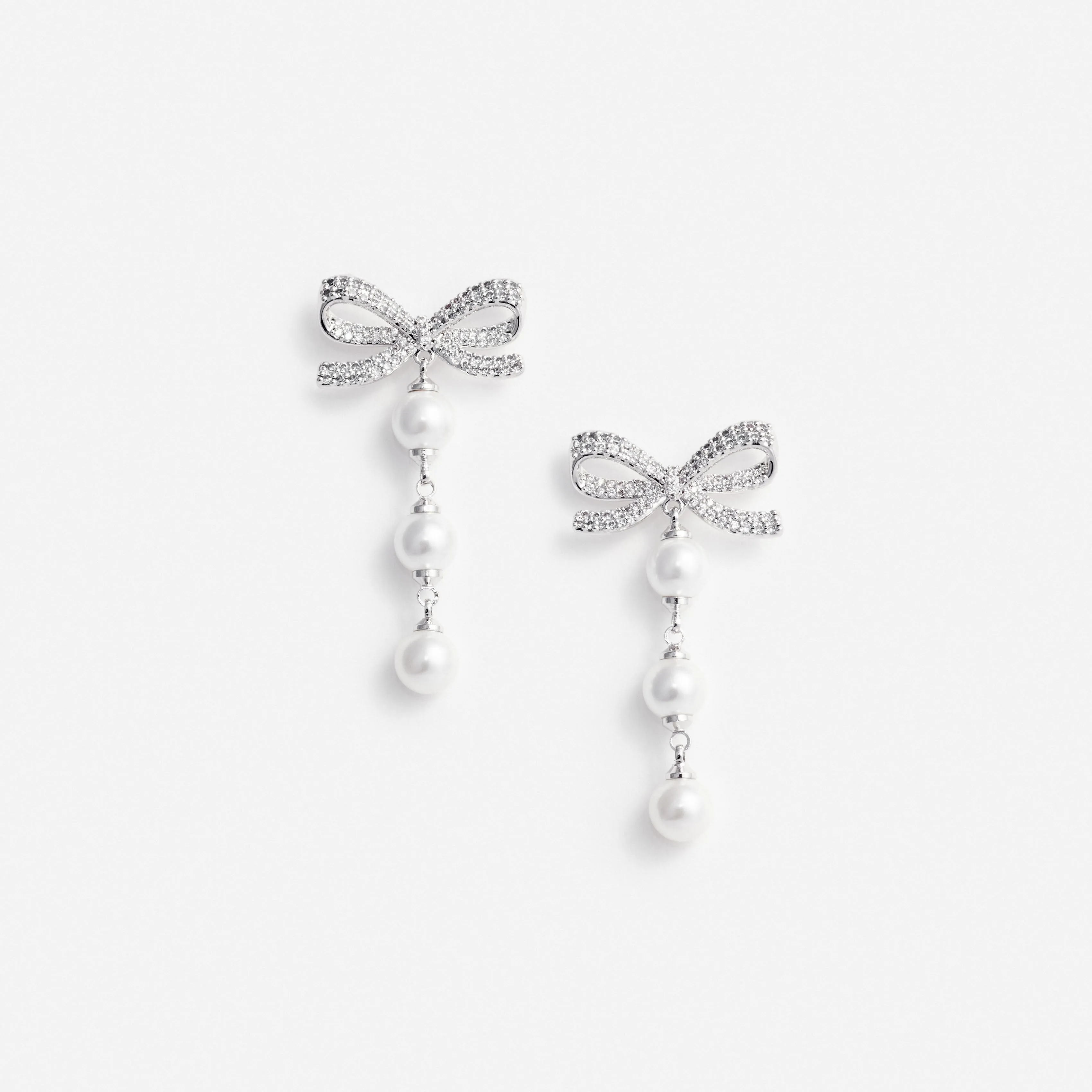 Bow Tiered Pearl Earrings sold by Self-Portrait