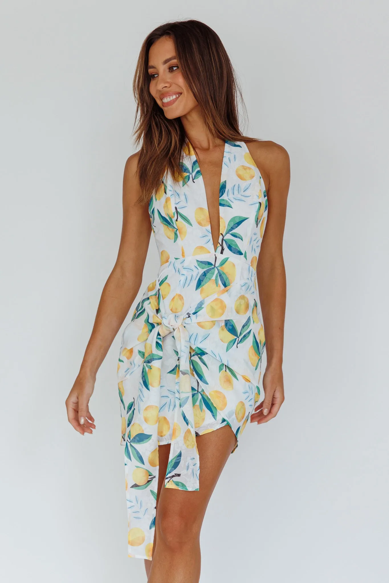Euro Trip Halter Wrap Mini Dress Lemon sold by Selfie Leslie product image thumbnail 3