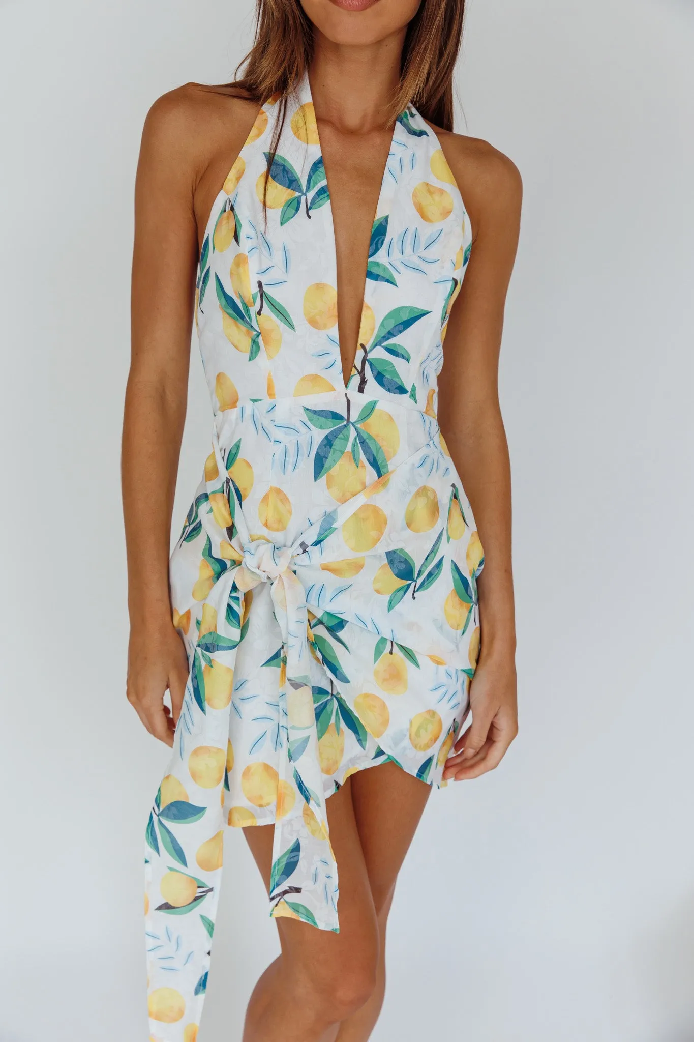 Euro Trip Halter Wrap Mini Dress Lemon sold by Selfie Leslie product image thumbnail 4