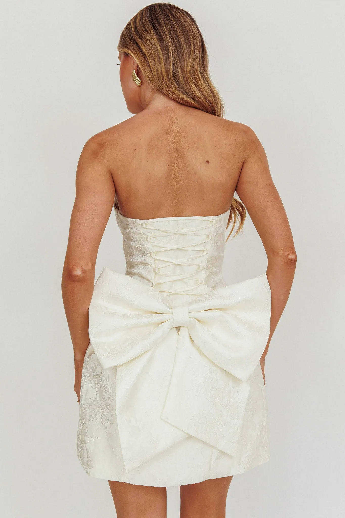 Melty Kisses Bow Mini Dress Cream sold by Selfie Leslie