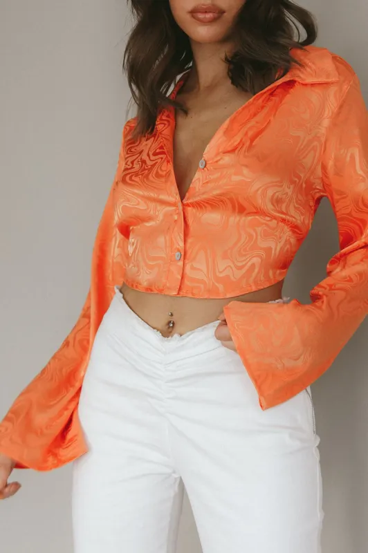 Ciara Flared Sleeve Tied Back Top Orange sold by Selfie Leslie