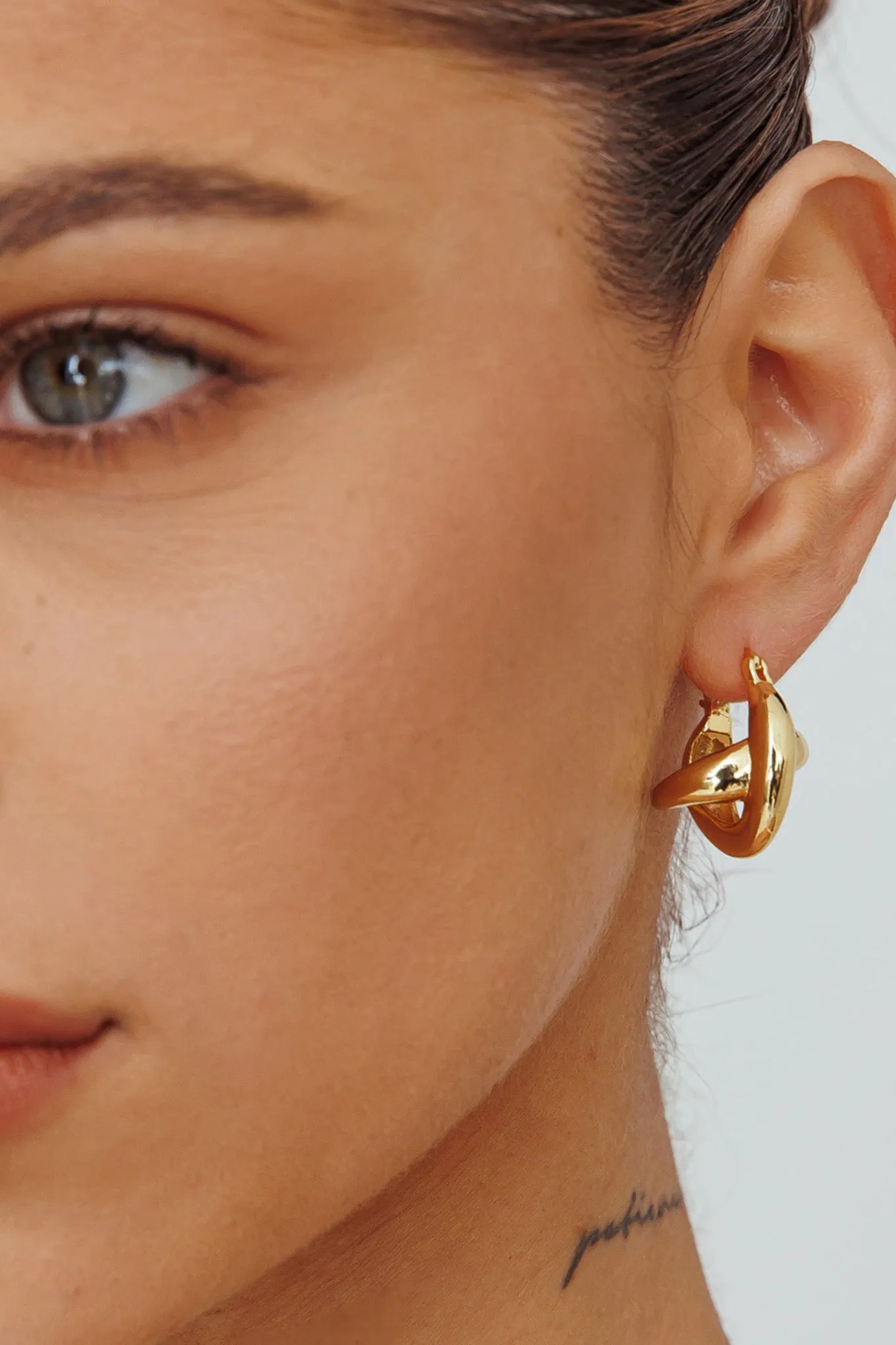 Jetset Cross Hoop Earrings Gold sold by Selfie Leslie