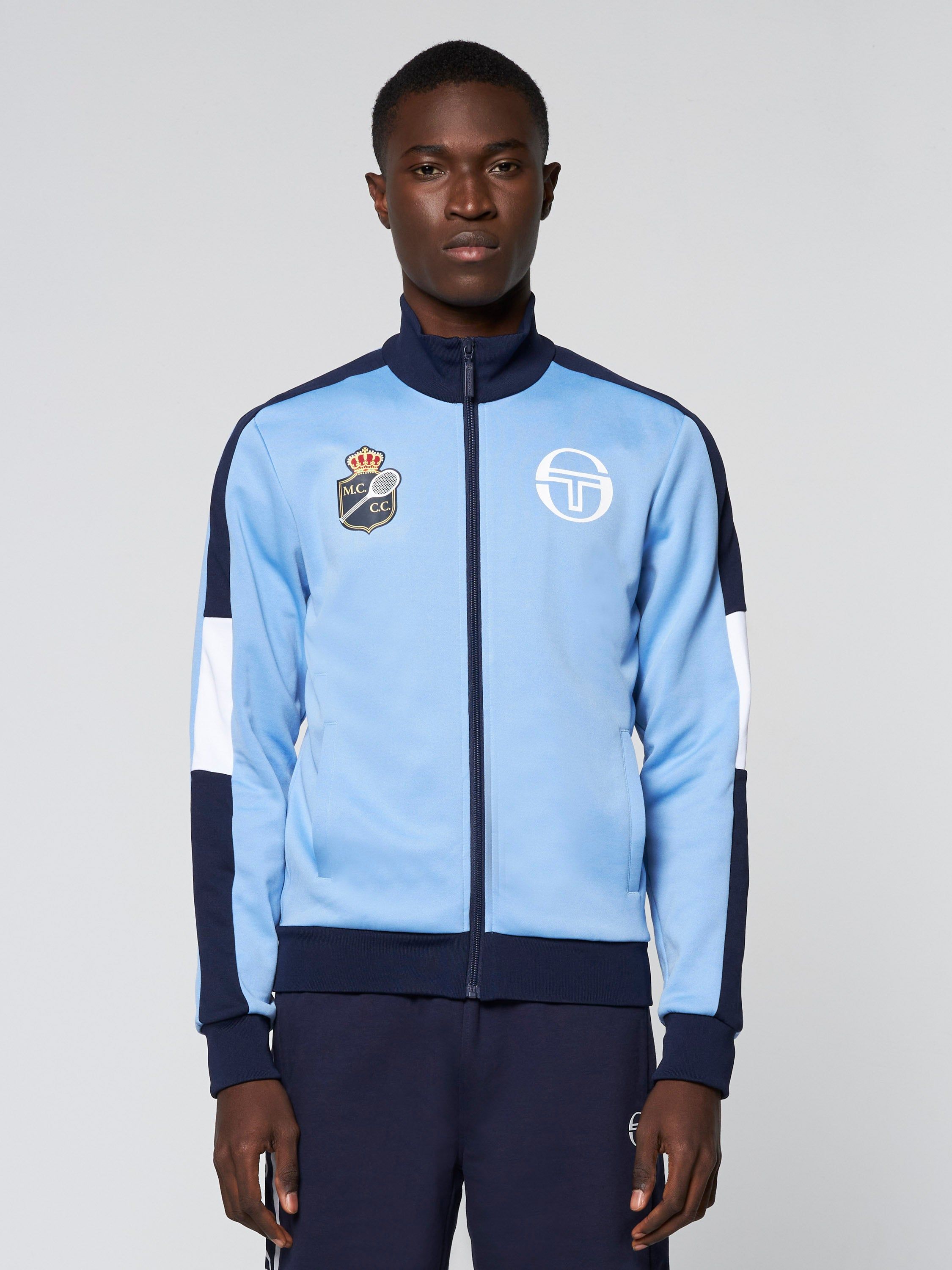 SLAM STAFF TRACK JACKET- Cornflower Blue/ Navy sold by Sergio Tacchini