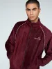 Debossed Velour Track Jacket-Grape Wine sold by Sergio Tacchini