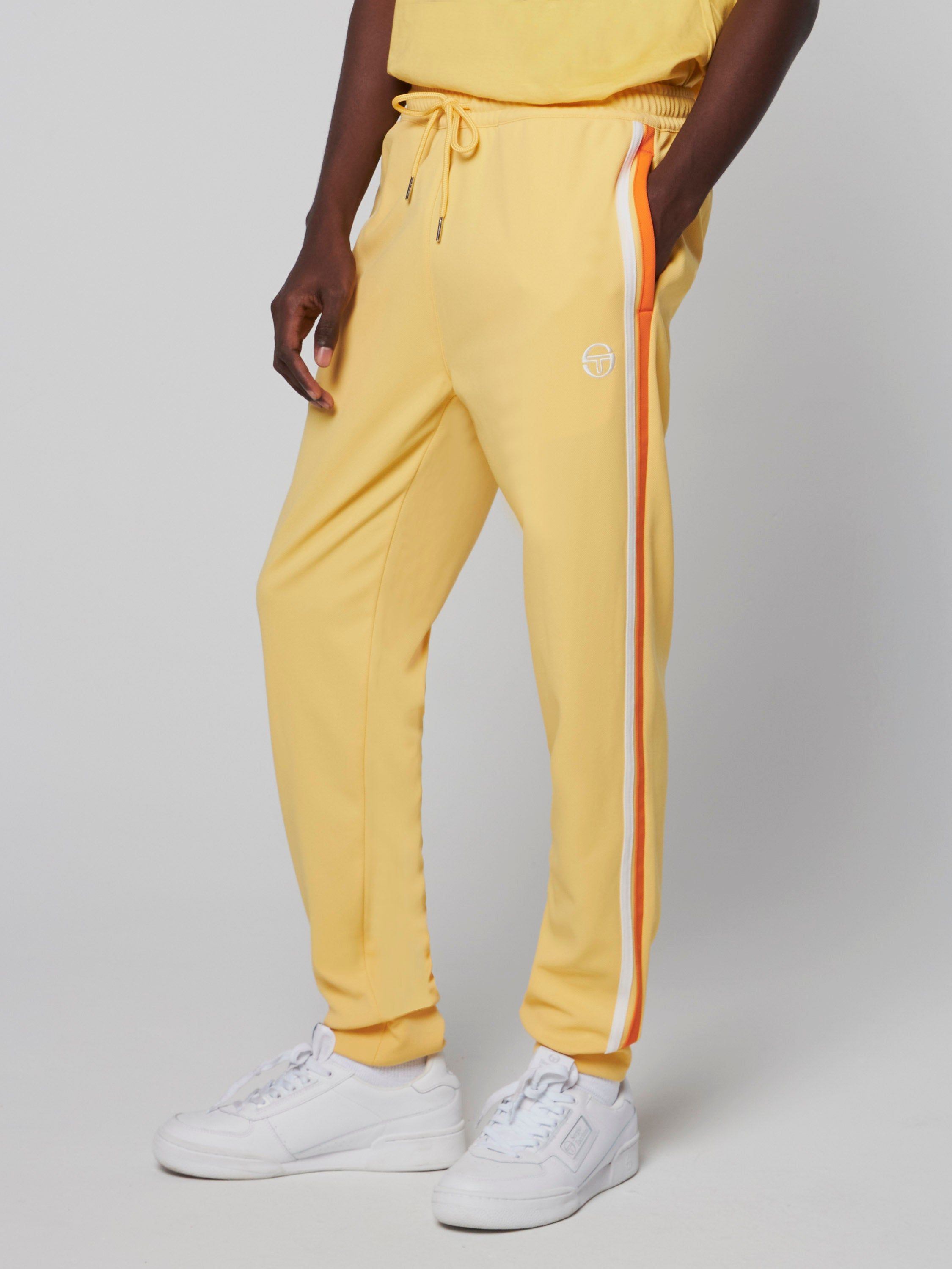 Damarindo Track Pant- Flax/ Dragon Fire sold by Sergio Tacchini