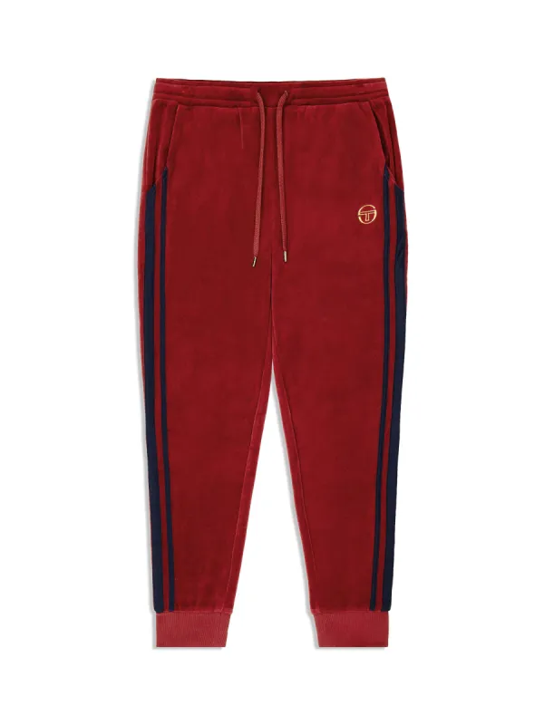 Damarindo Velour Track Pant- Merlot/ Maritime Blue sold by Sergio Tacchini