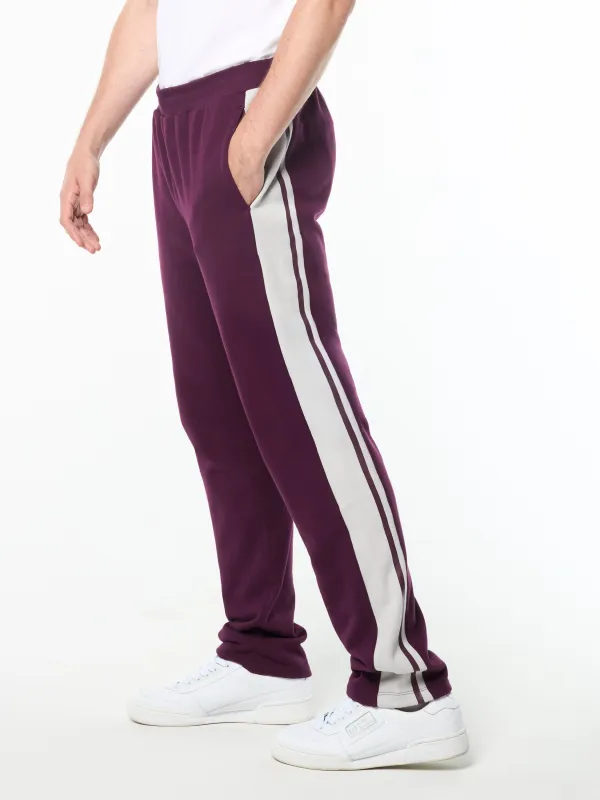 Cursivo Track Pant- Potent Purple made by Sergio Tacchini