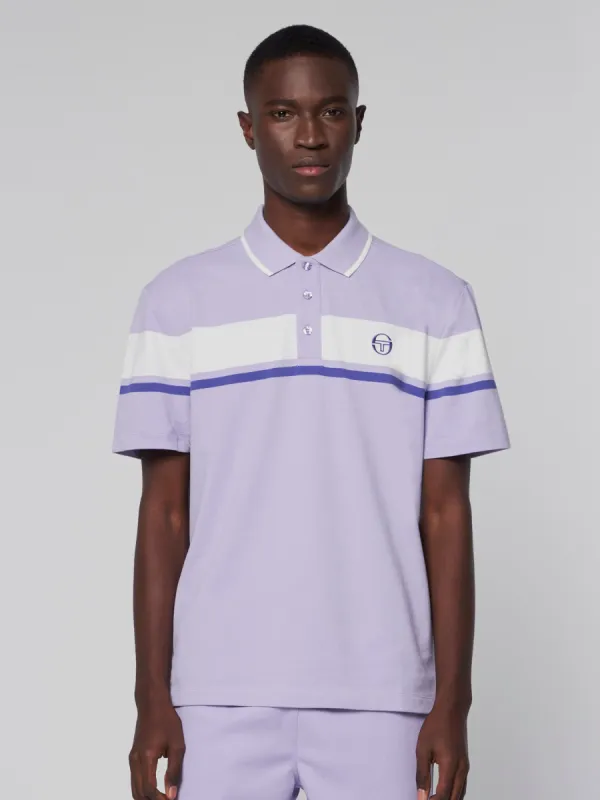 Damarindo Polo- Lavender/ Gardenia sold by Sergio Tacchini