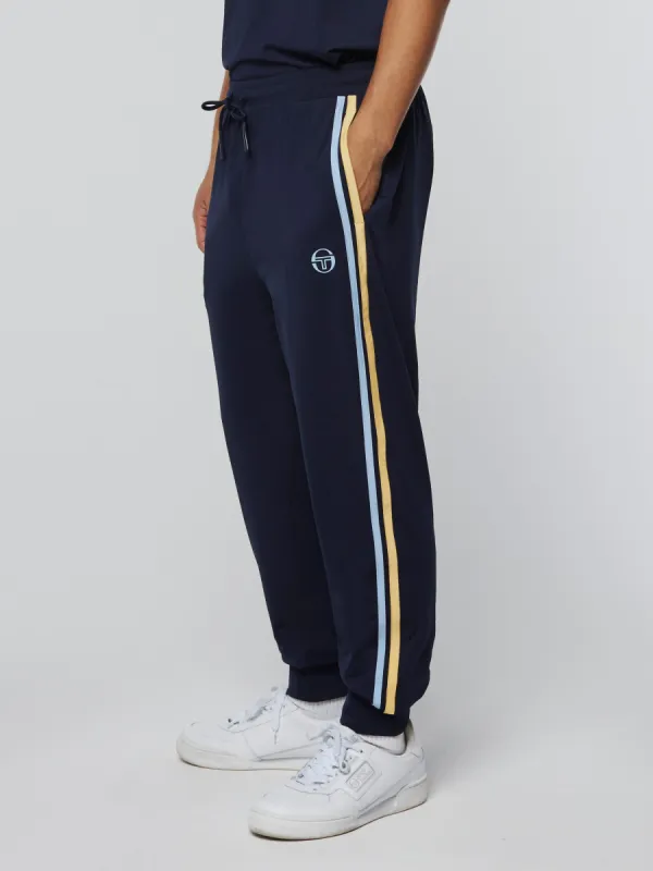 Mesh Damarindo Track Pant- Maritime Blue/ Flax sold by Sergio Tacchini