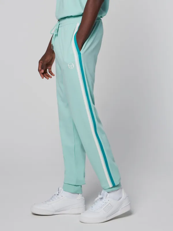 Damarindo Track Pant- Ocean Wave/ Blue Grass sold by Sergio Tacchini