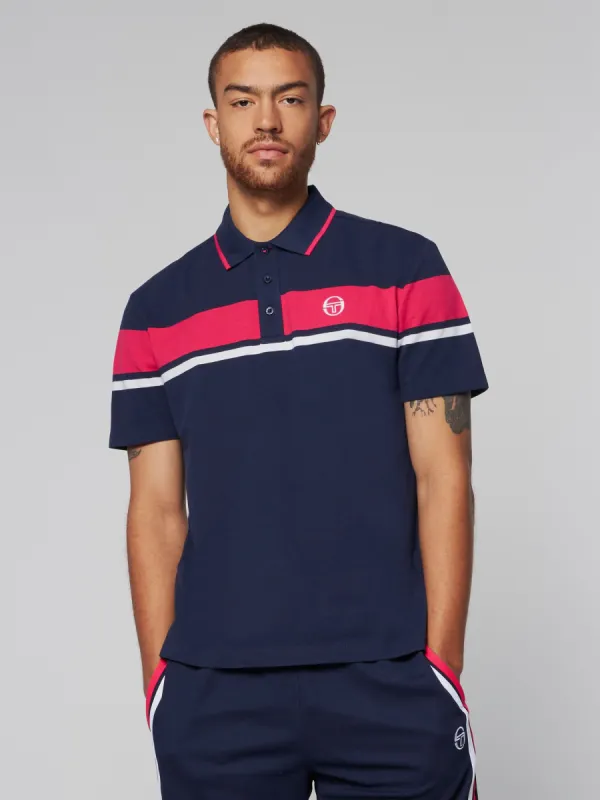 Damarindo Polo- Maritime Blue/ Rasberry sold by Sergio Tacchini