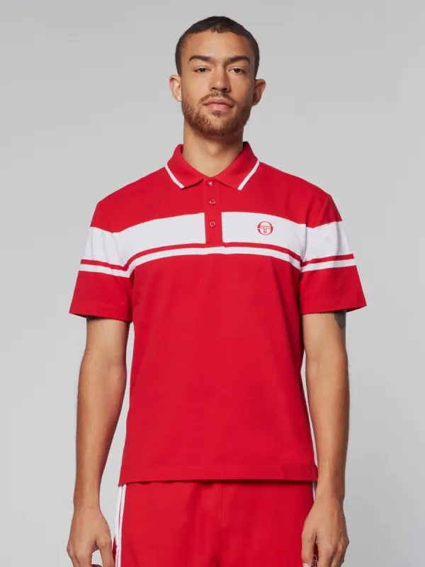 Damarindo Polo- Adrenaline Rush/ White sold by Sergio Tacchini