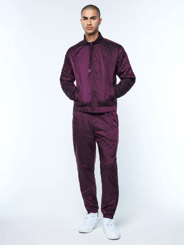 Iridescent Tracksuit-Grape Wine sold by Sergio Tacchini