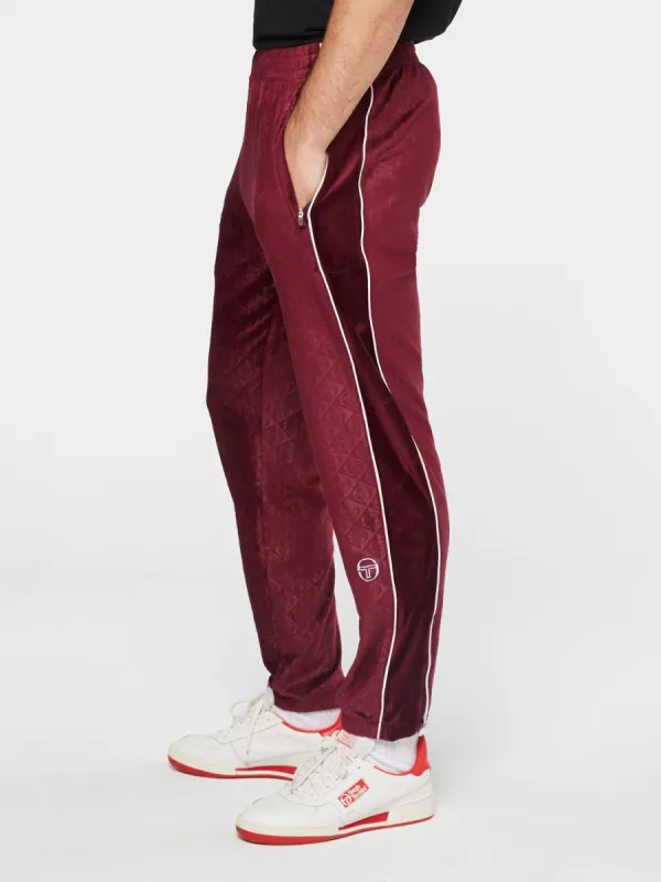 Debossed Velour Track Pants-Grape Wine sold by Sergio Tacchini