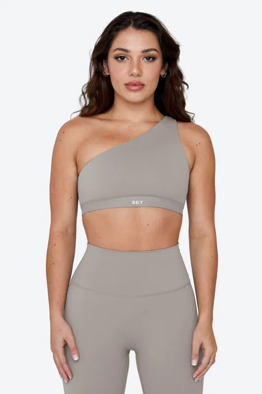 SPORTBODY® ONE SHOULDER BRA - STONE sold by SETactive