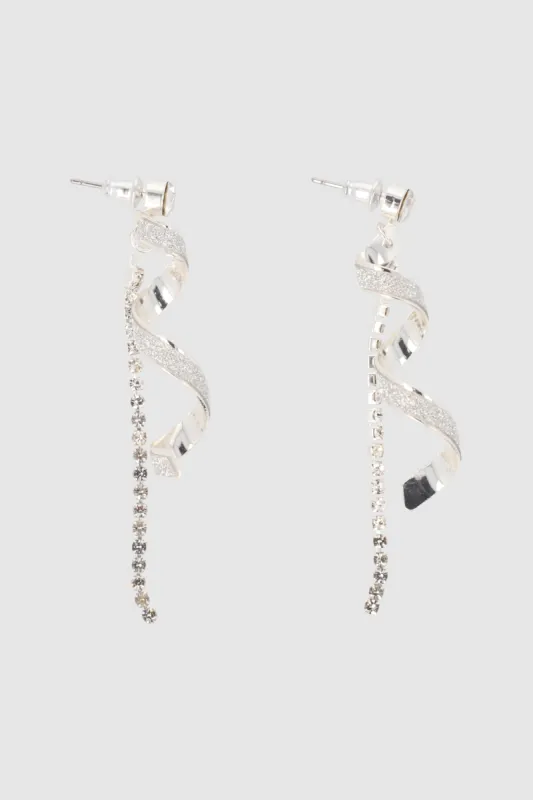 Aretes remolino glitter brillos sold by Shasa