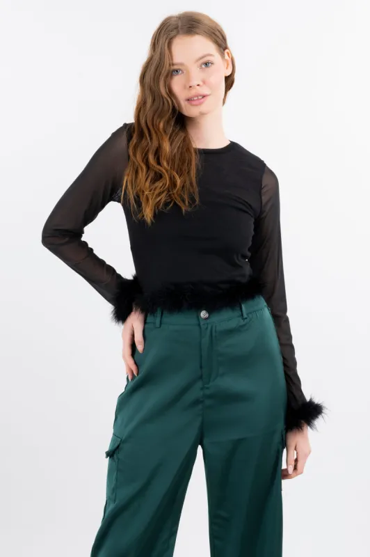 Top mesh manga larga plumas sold by Shasa