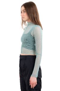 Top mesh manga larga costura sold by Shasa