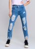 Jeans mom cintura media destrucción flecos sold by Shasa