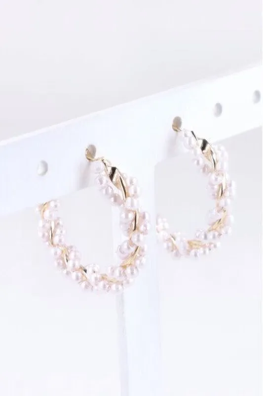 Arracadas remolino perlas sold by Shasa