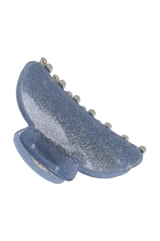 Pinza metálica glitter sold by Shasa