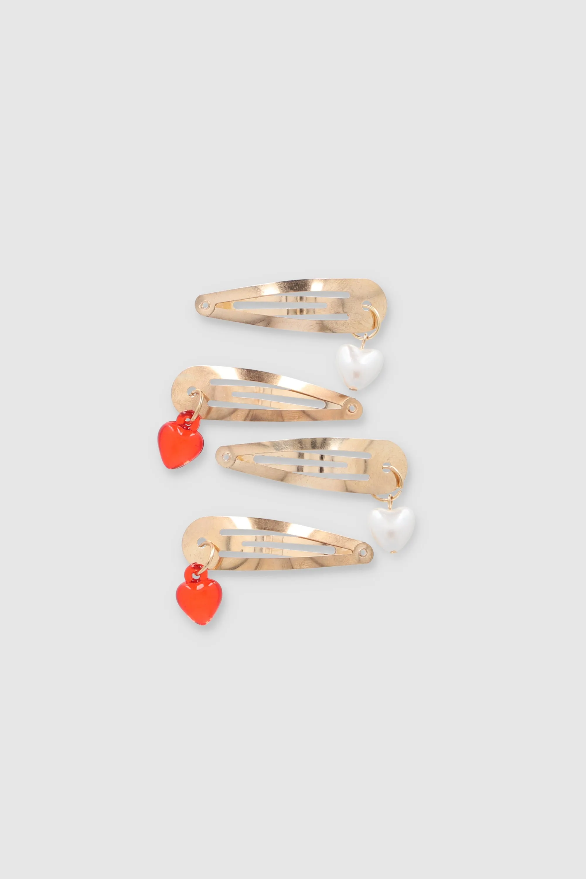 Set 2 pares pasadores corazones sold by Shasa