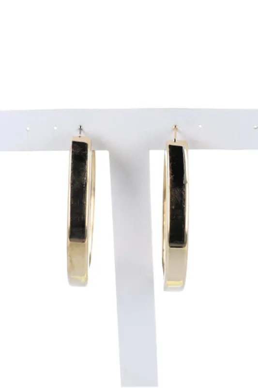 Arracadas metálicas lisas sold by Shasa