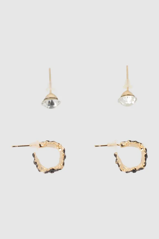 Set 2 pares aretes flores sold by Shasa