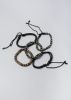 Set 5 pulseras materiales mixtos sold by Shasa