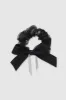Scrunchie moño brillos sold by Shasa