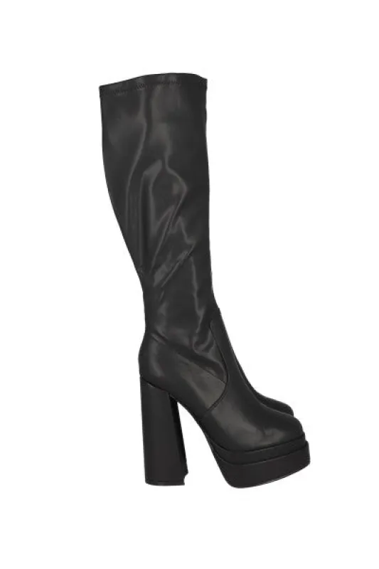 Botas largas plataforma alta sold by Shasa