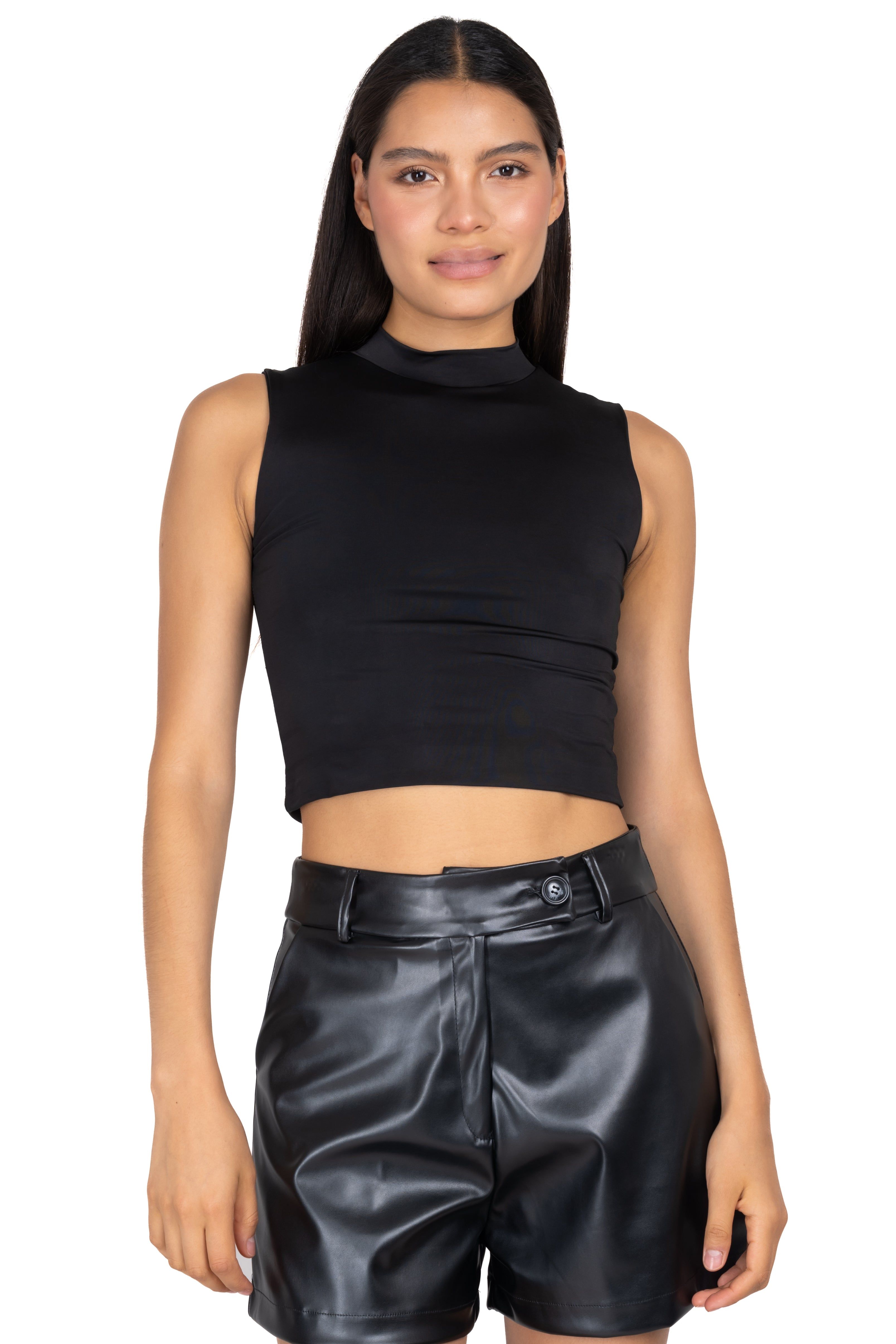 Top liso cuello alto sold by Shasa