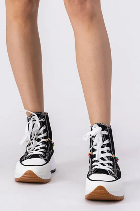 Tenis canvas plataforma bicolor sold by Shasa