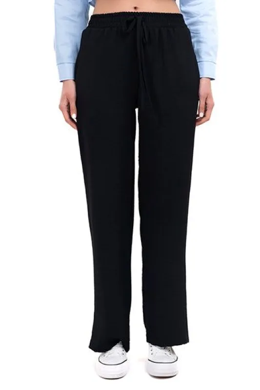 Pantalón Fluido Cintas sold by Shasa