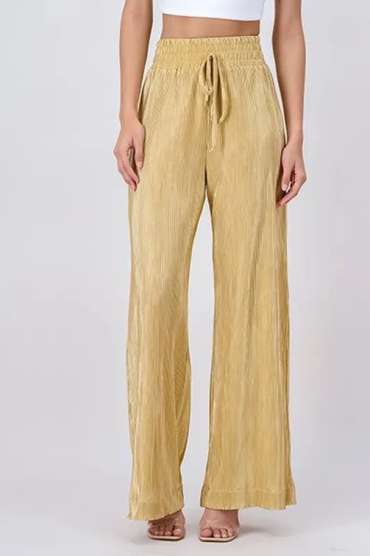 Pantalón recto plisado elástico sold by Shasa