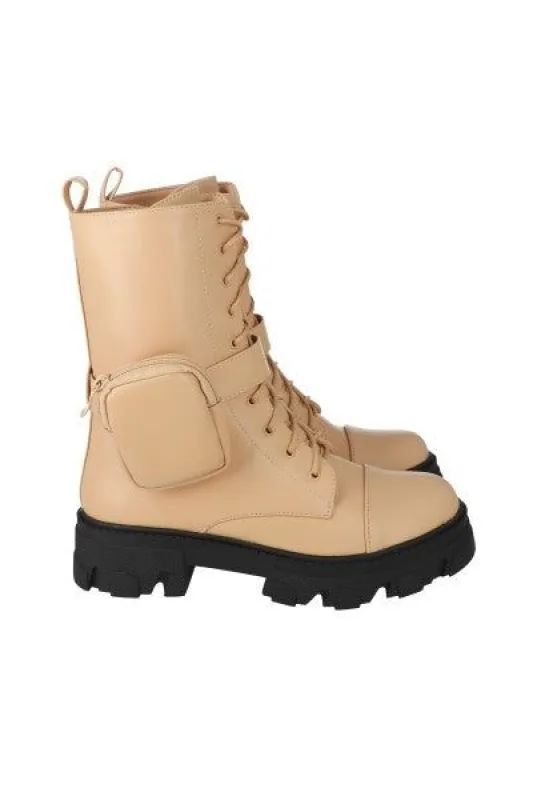 Bota combat larga con monedero sold by Shasa