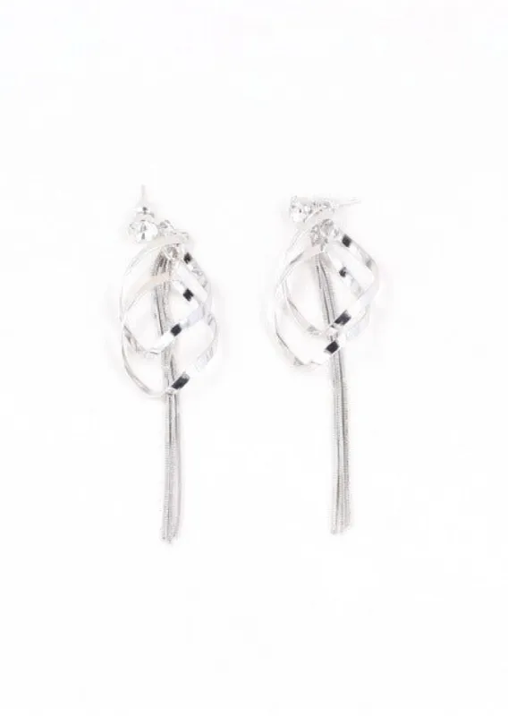 Aretes remolino brillos sold by Shasa