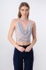 Top halter tejido brillos sold by Shasa