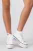 Tenis botín efecto piel sold by Shasa