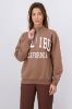 Sudadera cierre estampado Malibu sold by Shasa