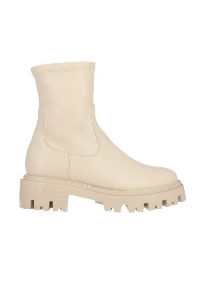 Botín elástico suela dentada sold by Shasa