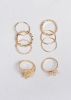 Set 8 Piezas Anillos Hojas sold by Shasa