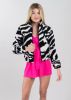 Chamarra sherpa animal print sold by Shasa