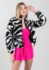 Chamarra sherpa animal print sold by Shasa