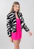 Chamarra sherpa animal print sold by Shasa
