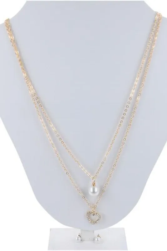 Set collar doble aretes perlas sold by Shasa